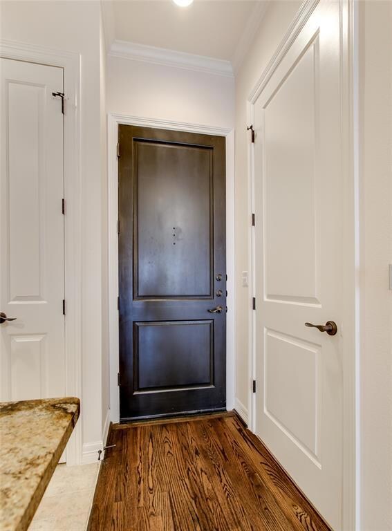 Front door entry. The door on the right is an inte