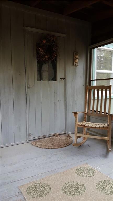 Screen porch entry into the living room.