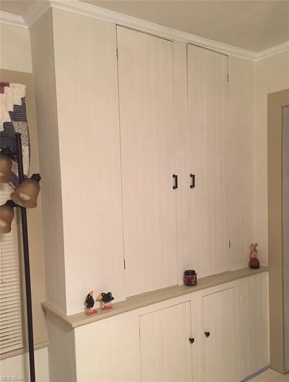 Kitchen cabinetry, possibly original to the house.  Great storage.