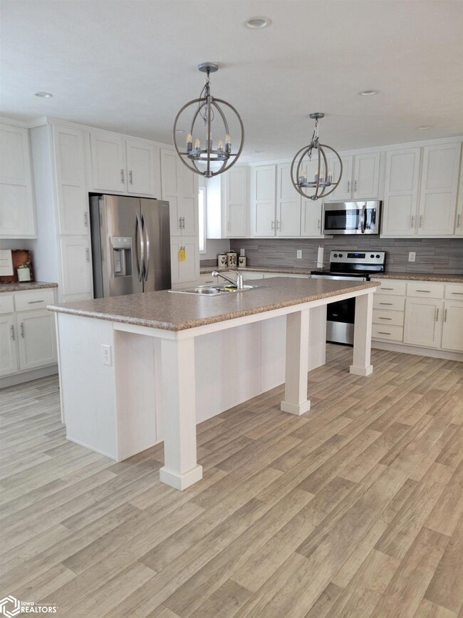 Seating area for bar stools, sink, dishwasher, lot