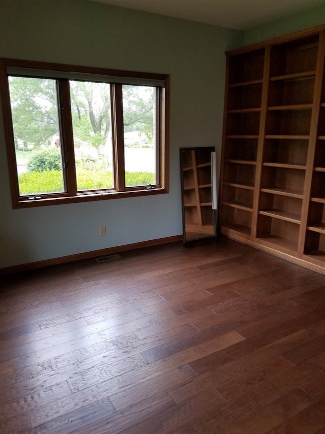 This sunny office space has lots of storage space 