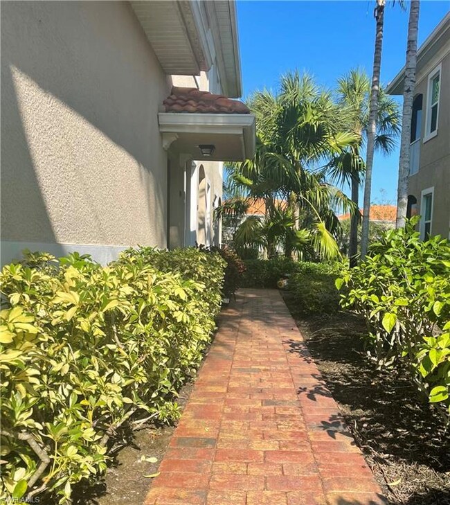 Paver walkway to private front door