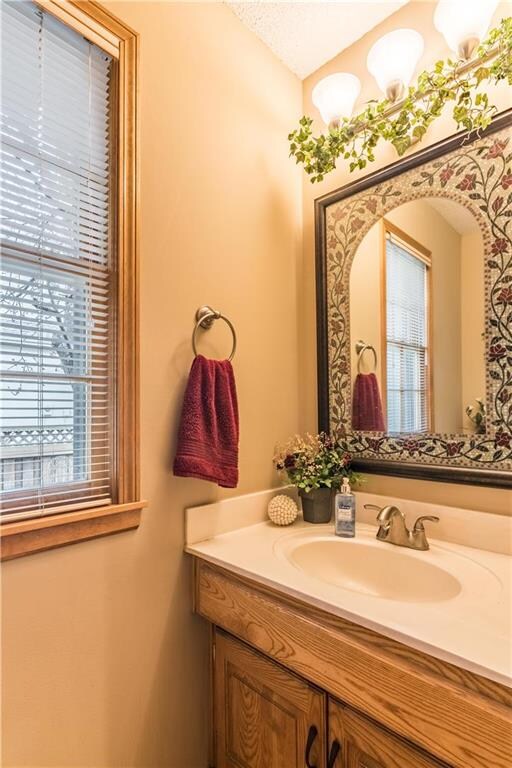 1/2 bath just off the kitchen.