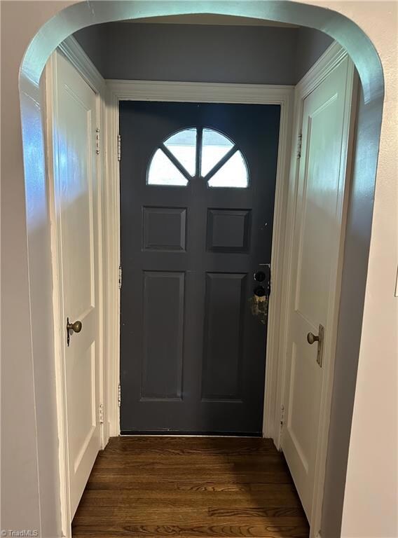 Front door in living room two closets!