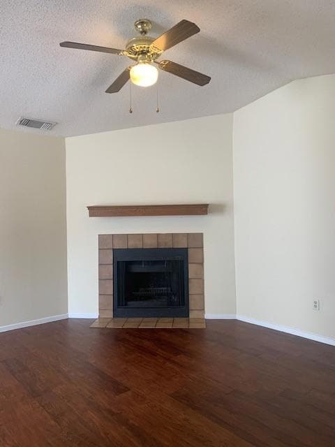 Unfurnished living room featuring a textured ceil