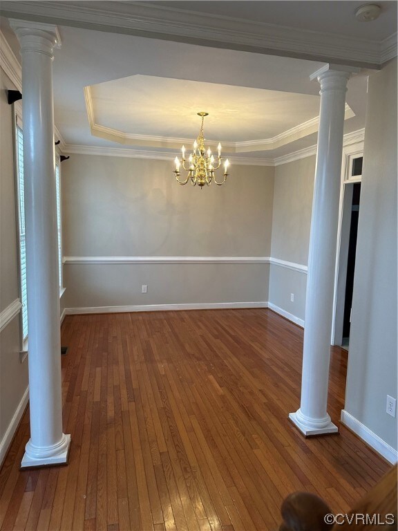 Empty room with decorative columns, an inviting ch
