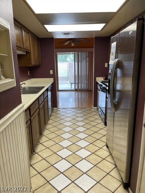 Kitchen looking down to dining area.