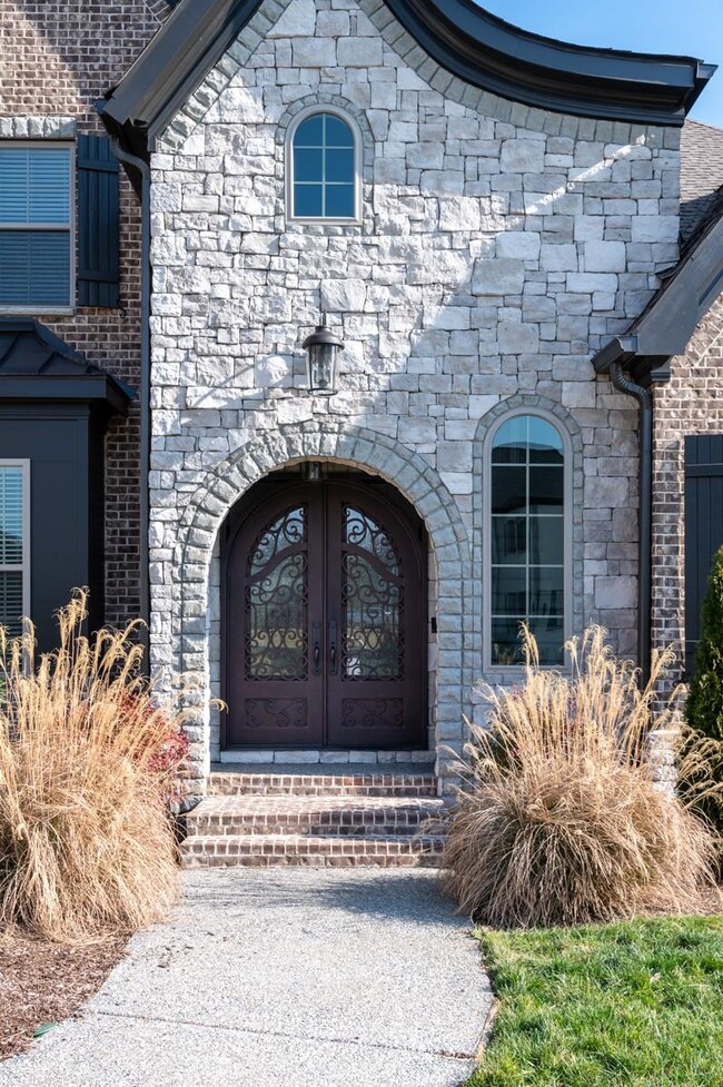 Ornate iron entry door makes the perfect first impression to all visitors. Only 2 steps in to the front door as well.