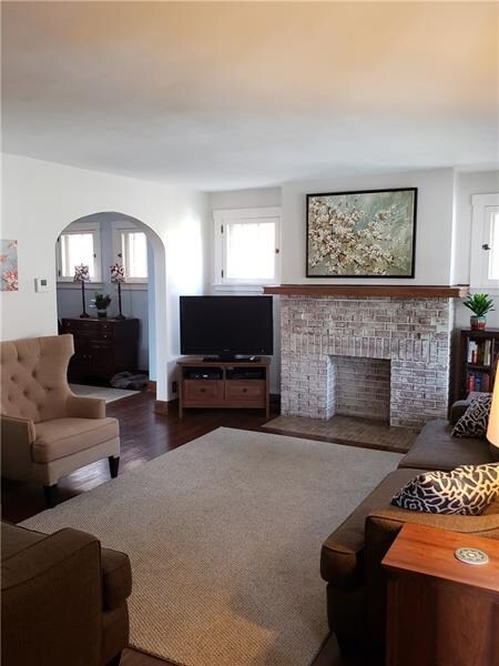 Spacious Living room with refinished hardwood