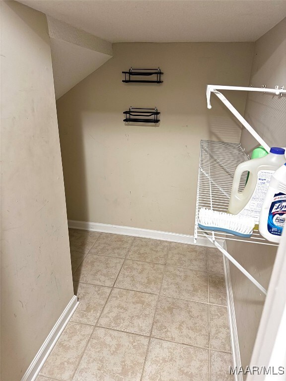 storage closet underneath the stairs