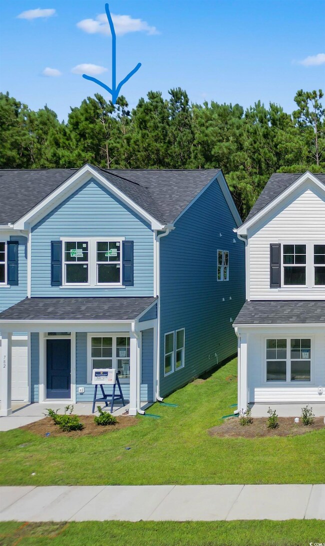 View of front of house featuring a front lawn and 