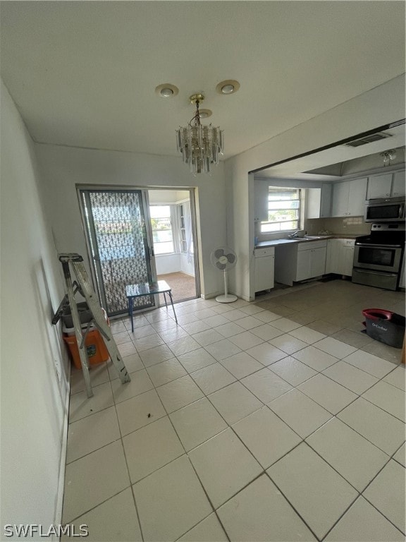 Unfurnished dining area featuring plenty of natura