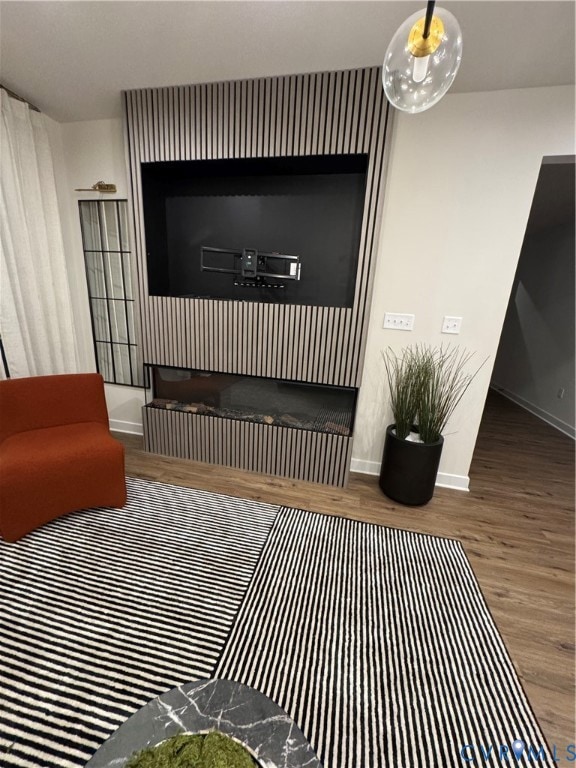 Detailed view of wood finished floors and baseboards