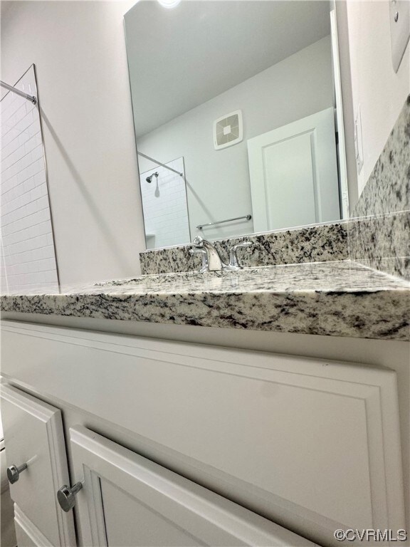 Bathroom featuring oversized vanity