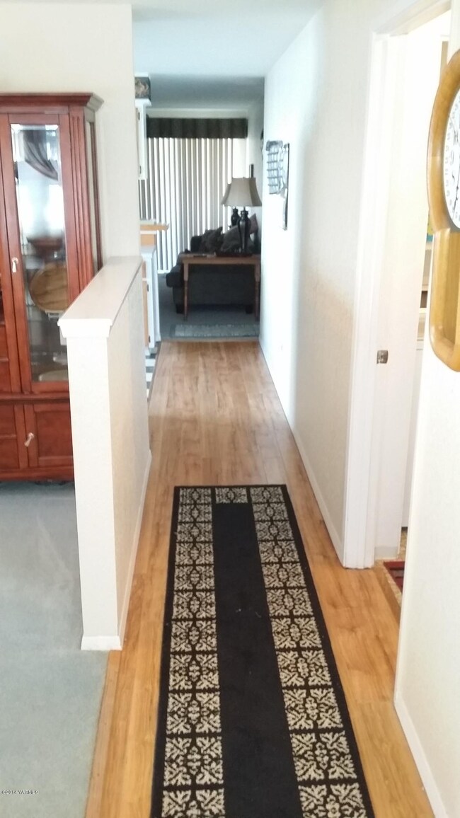 Wood floor on entry and in hall