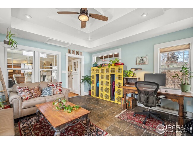 This light filled sunroom is great for an office.