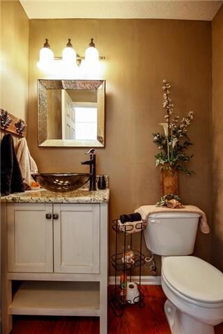 There is a charming powder room located on the main level.