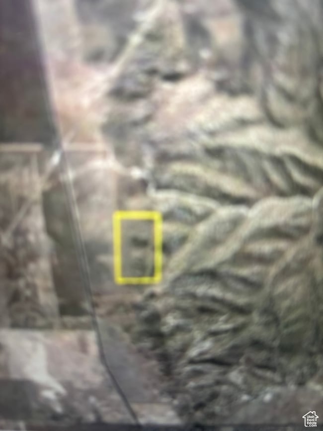 Aerial overview of property's location with property parcel outlined