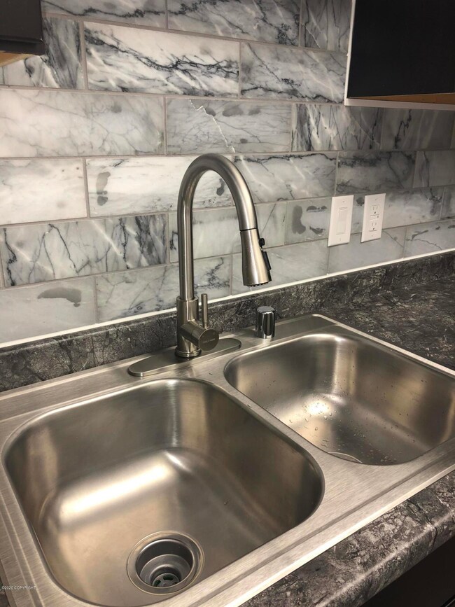 New sink/faucet/tile