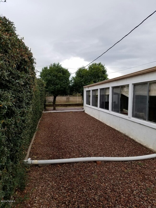 Gravel backyard 950 W Gateway St