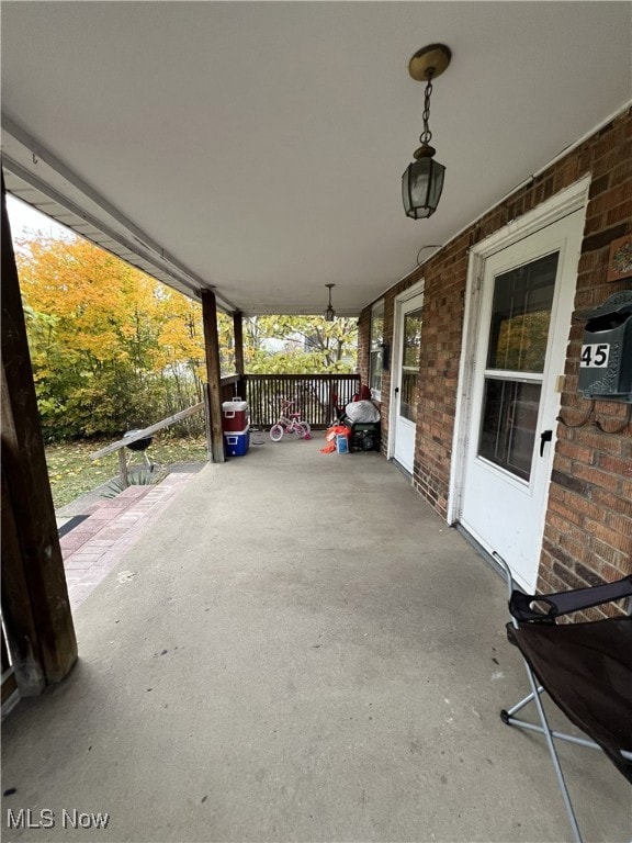 View of front porch and separate doors for each unit
