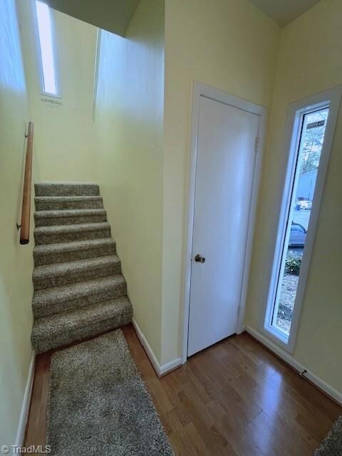 Enter at ground level, stairs to upper level unit.
