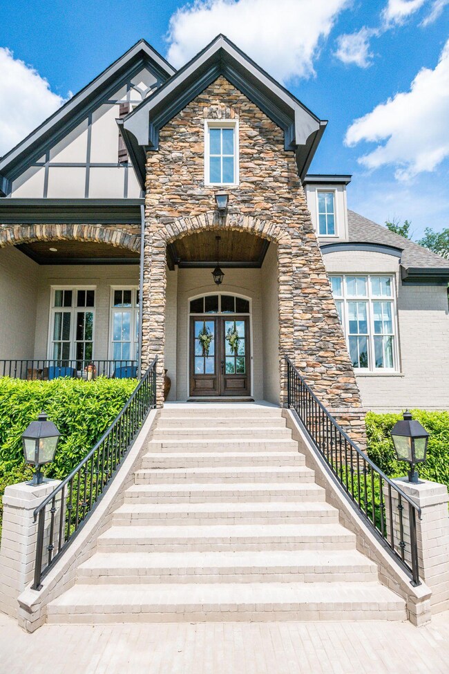 Every aspect of this beautiful home will make you proud to be its owner - from the sweeping stairs to the front entry to the coffered ceilings on the main floor.