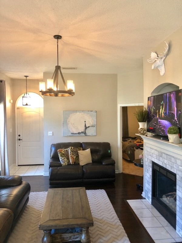 Den with gorgeous hardwood floors.  View of marble