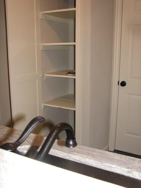 Cabinet storage in kitchen.