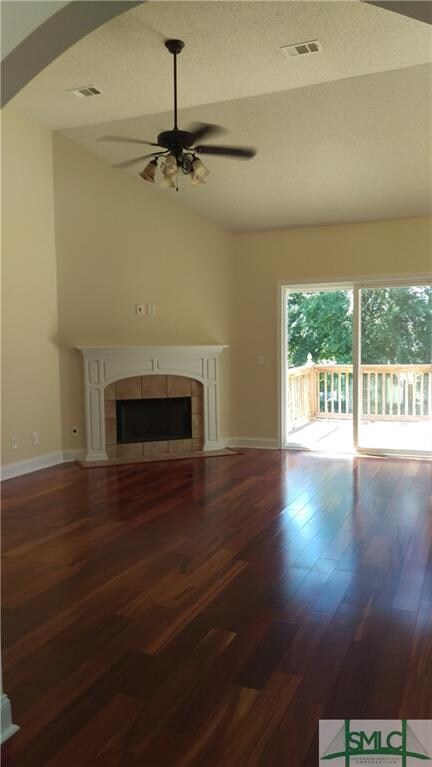 Living room with fireplace.  Beautiful tiger wood 