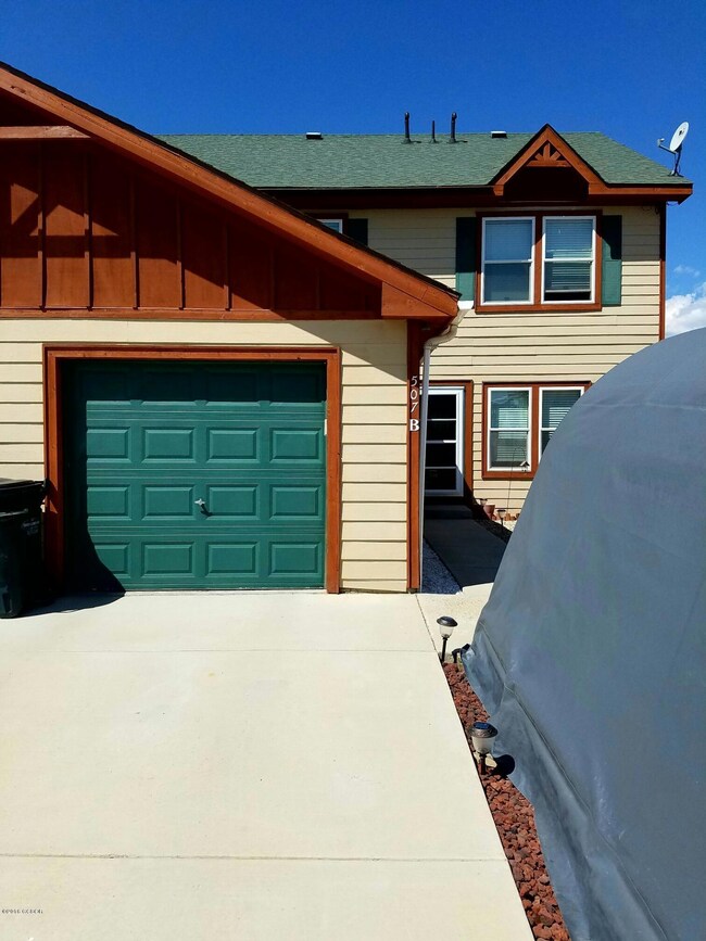 Front w garage, sunny