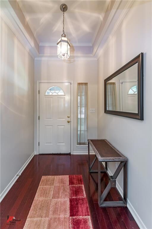 Main entry with tray ceilings.