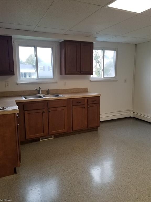 This very large kitchen also has a deep closet tha