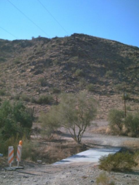 A bridge that leads to back of lot