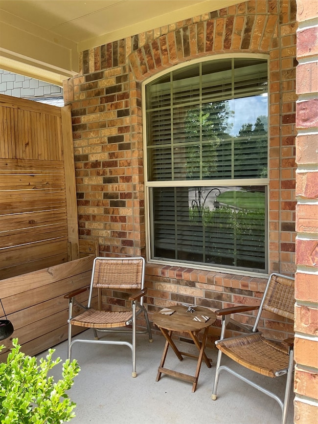 You will enjoy this very cozy front porch