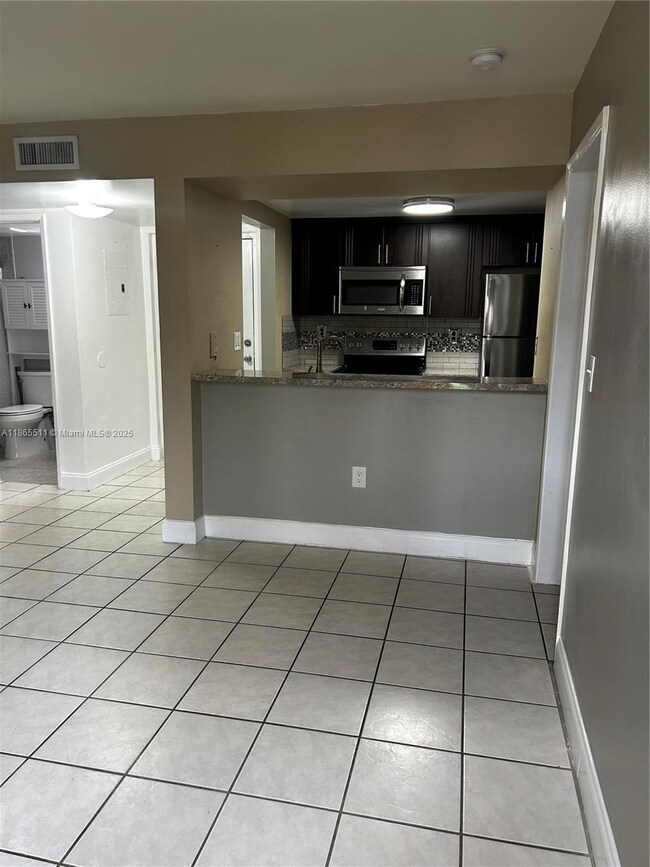 Las Brisas at Country Club of Miami unit D107, Hialeah, FL 33015 - photo 3