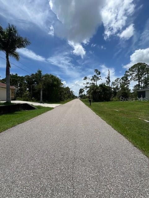 Paved County maintained road.