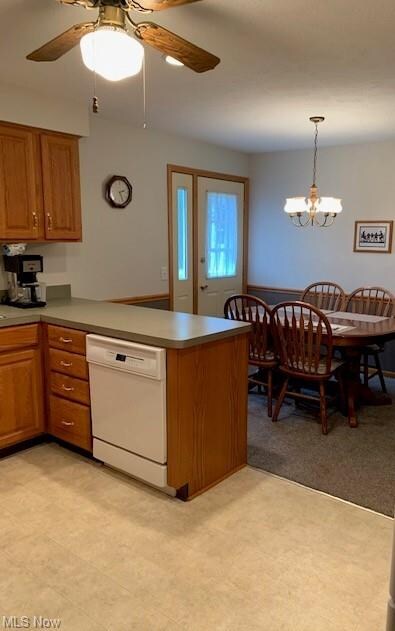 Door in dining area leads to quaint back patio.