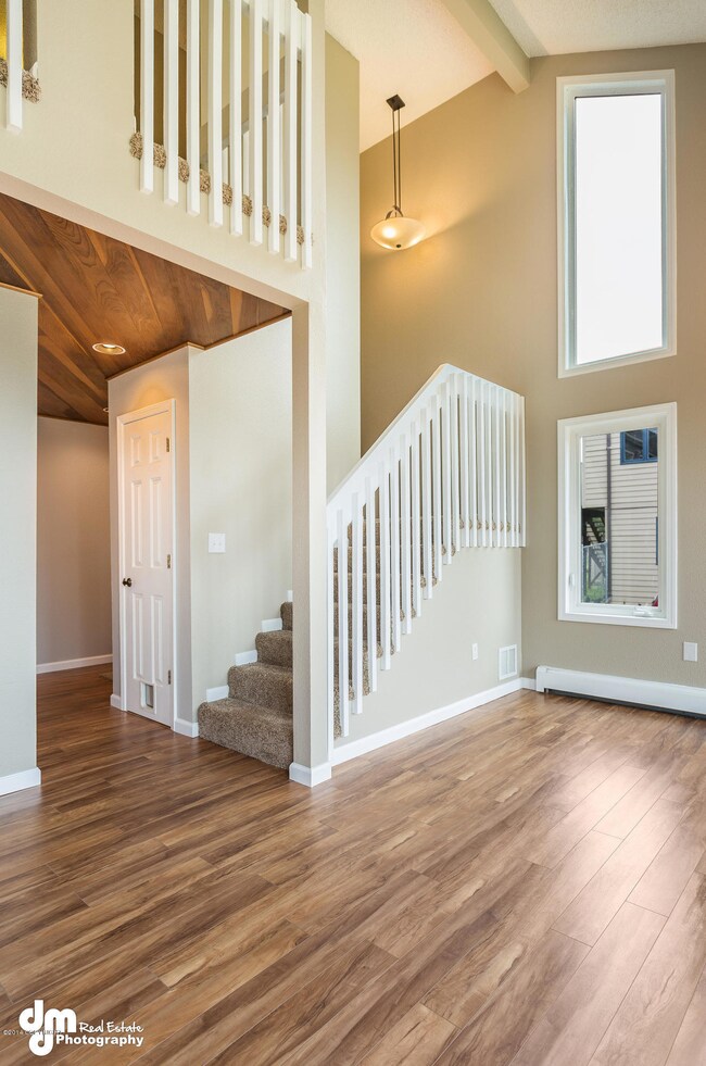 Living Room with Open Space/Loft Above