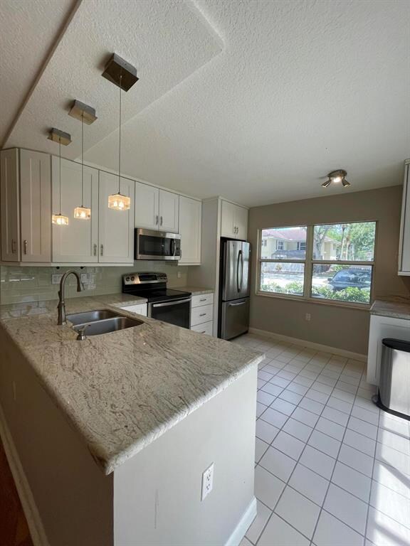 34 Clinton Ct unit C, Royal Palm Beach, FL 33411 - photo 3