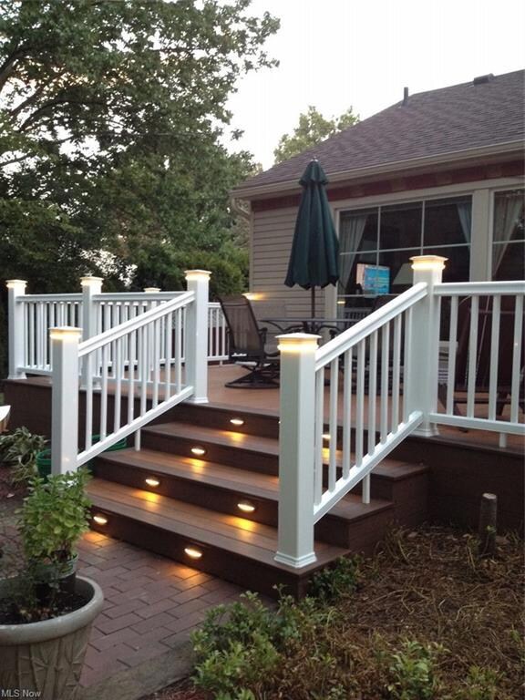 The deck is the perfect spot to enjoy the lush bac