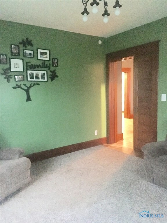 Front living area with pocket door.