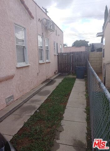 Long driveway leading to 2 car garage