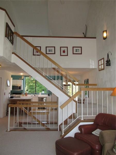 This condo offers open railings to make the space 