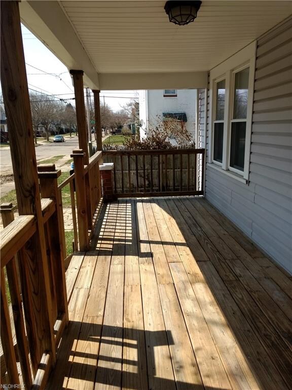 Nice front porch-perfect for a swing and porch fur