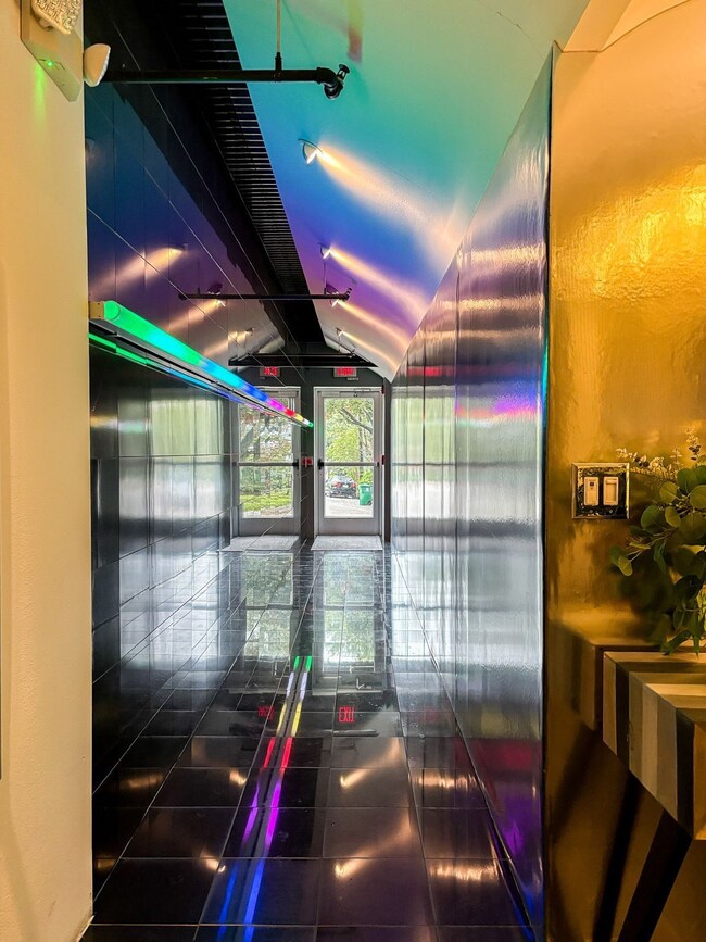 View of entry way looking towards glass front door