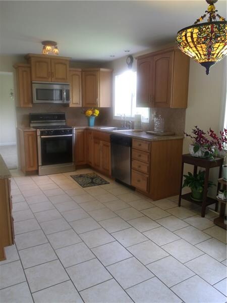 Another view of the spacious kitchen.