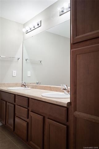 dual vanity and storage cabinet master bath!