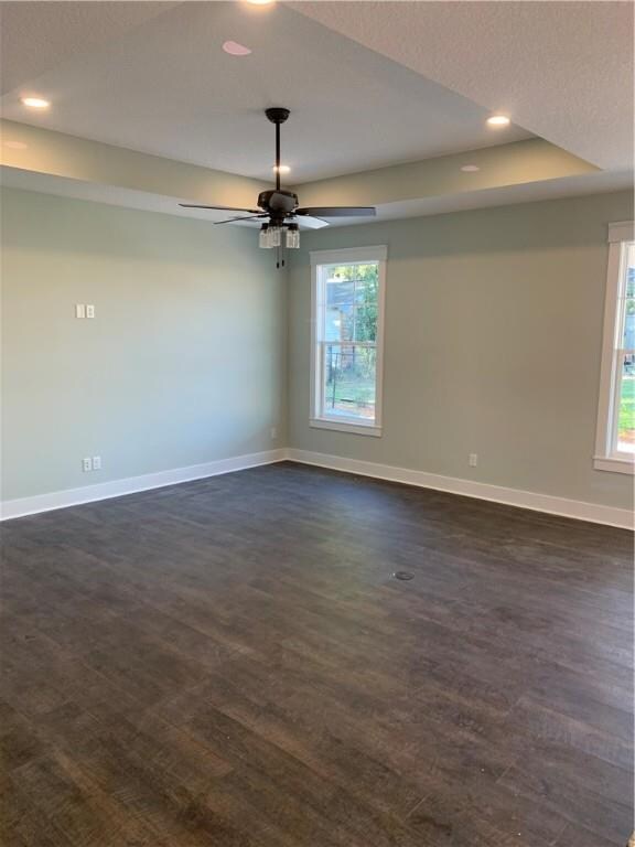 Master Bedroom features tray ceiling with recessed