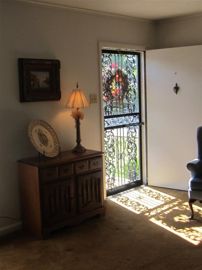 Enter the front into a large living space.....room